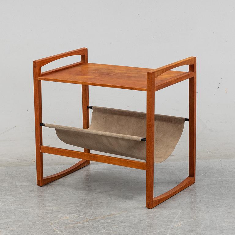 Kai Kristiansen, a teak and suede table.  Sika Møbler, Denmark.