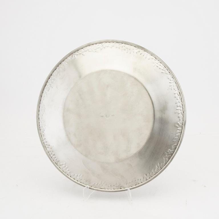 Signe Persson-Melin, a polished pewter plate "Myrten" for Firma Svenskt Tenn 2006.