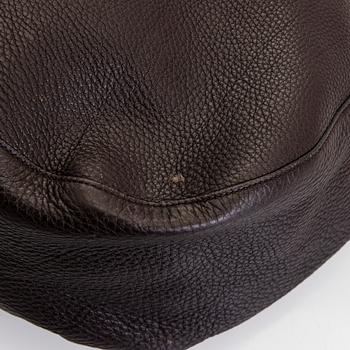 Gucci, an "Interlocking G" bag.