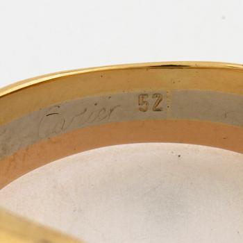 A brilliant cut diamond ring by Cartier.