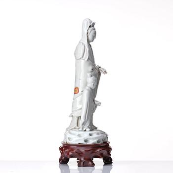 A blanc de chine figure of Guanyin and a servant, Qing dynasty, 19th Century.