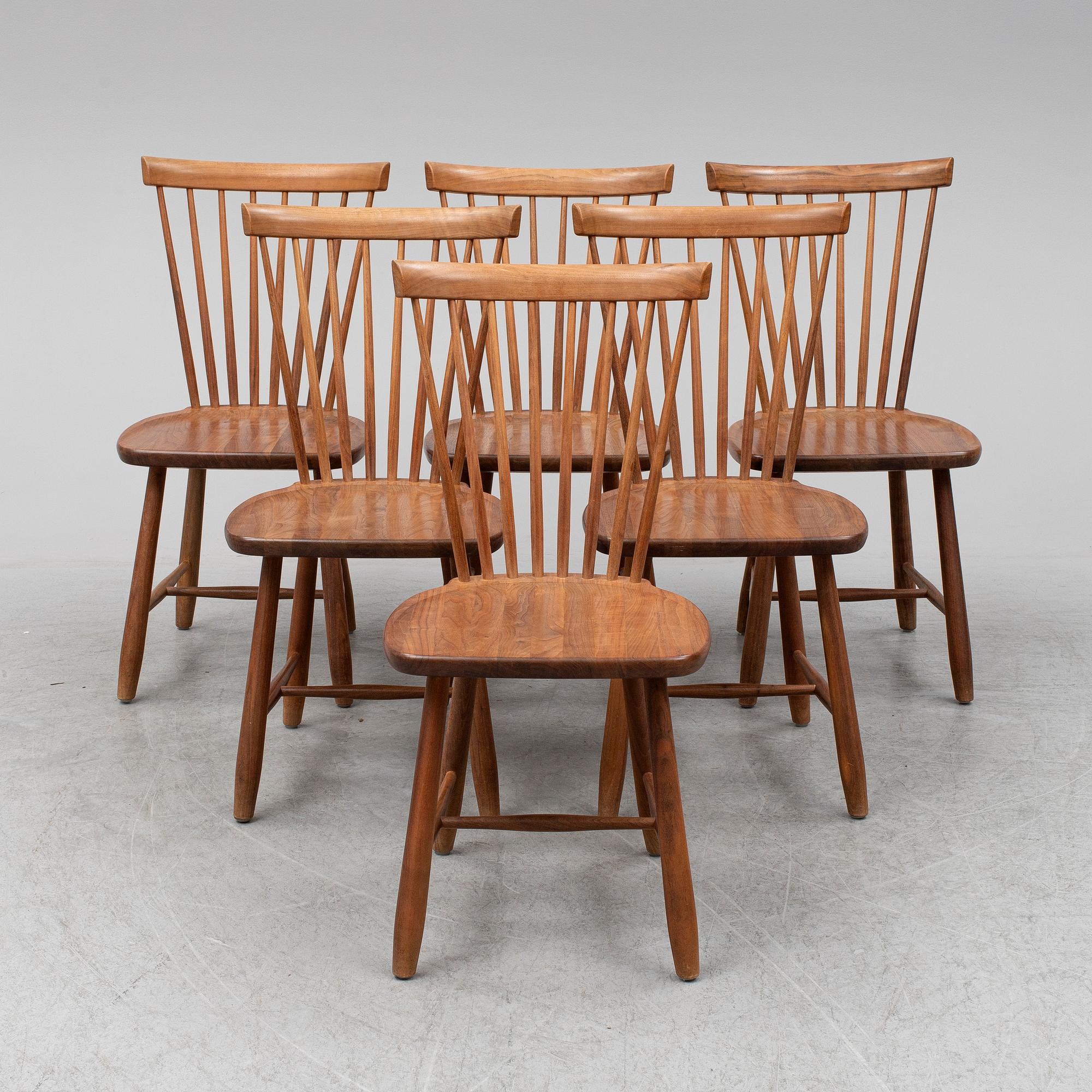 Six chairs by Carl Malmsten, limited edition, for Stolab, 2012.