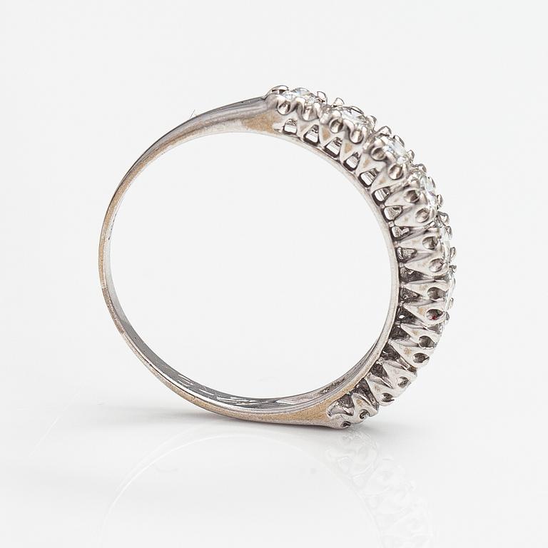 Sormus, 14K valkokultaa, timantteja n. 0.66 ct yht. Suomalaiset tuontileimat 1987.