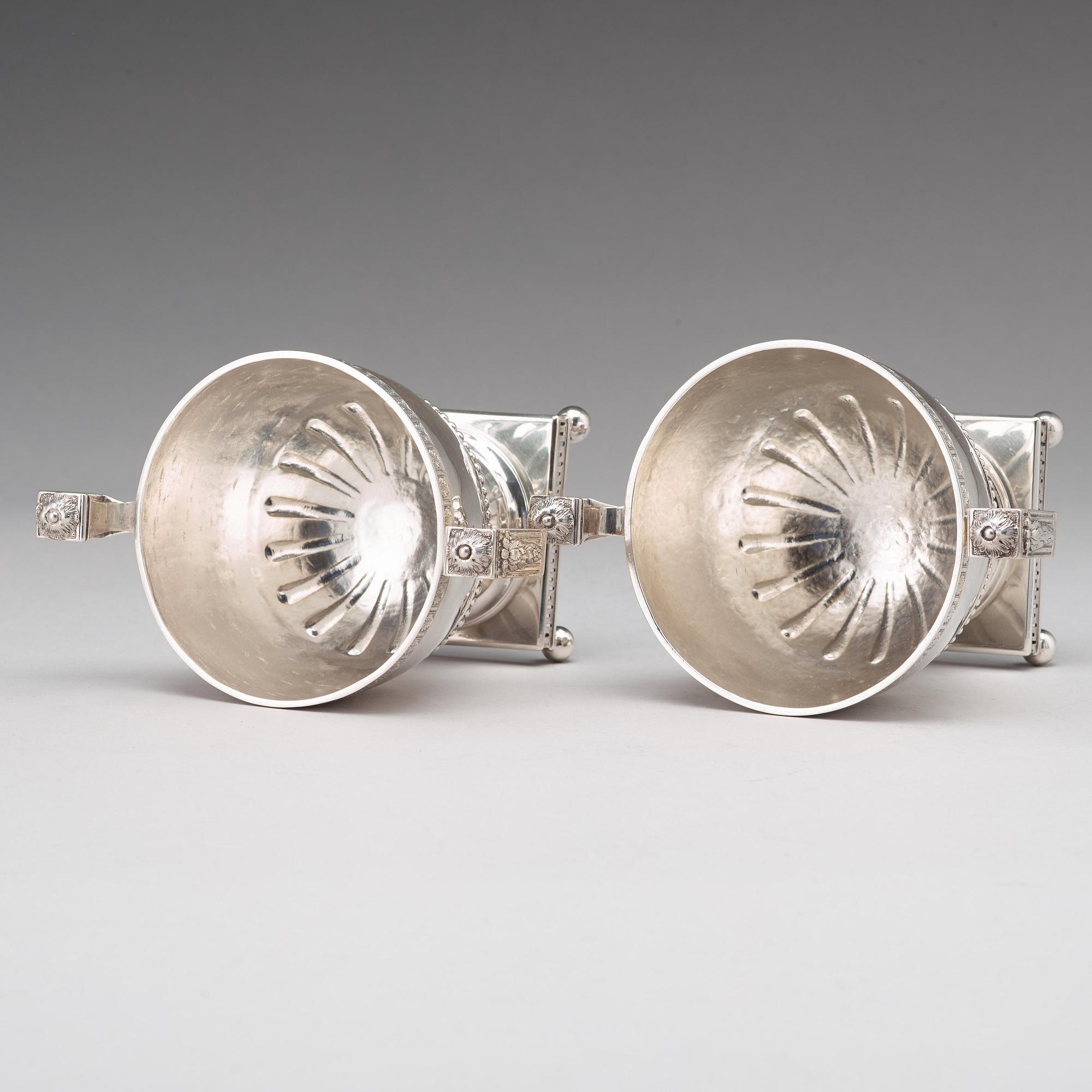 A pair of Swedish late 18th century silver sugar bowls and covers, mark of Pehr Zethelius, Stockholm 1780 and 1781.