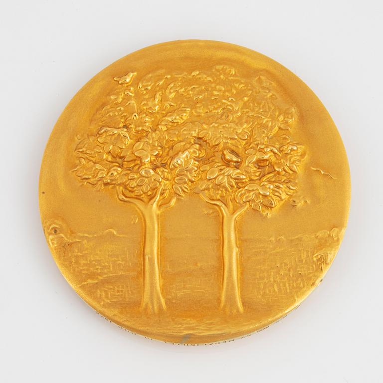 A Swedish commemorative medal in 18K gold.