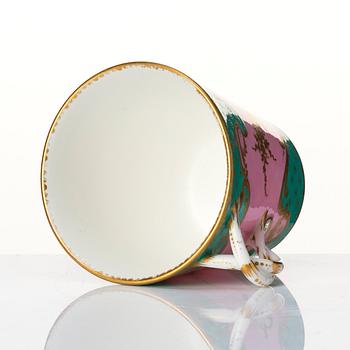 A French 'Sèvres' cup and tremleuse saucer, 19th Century.