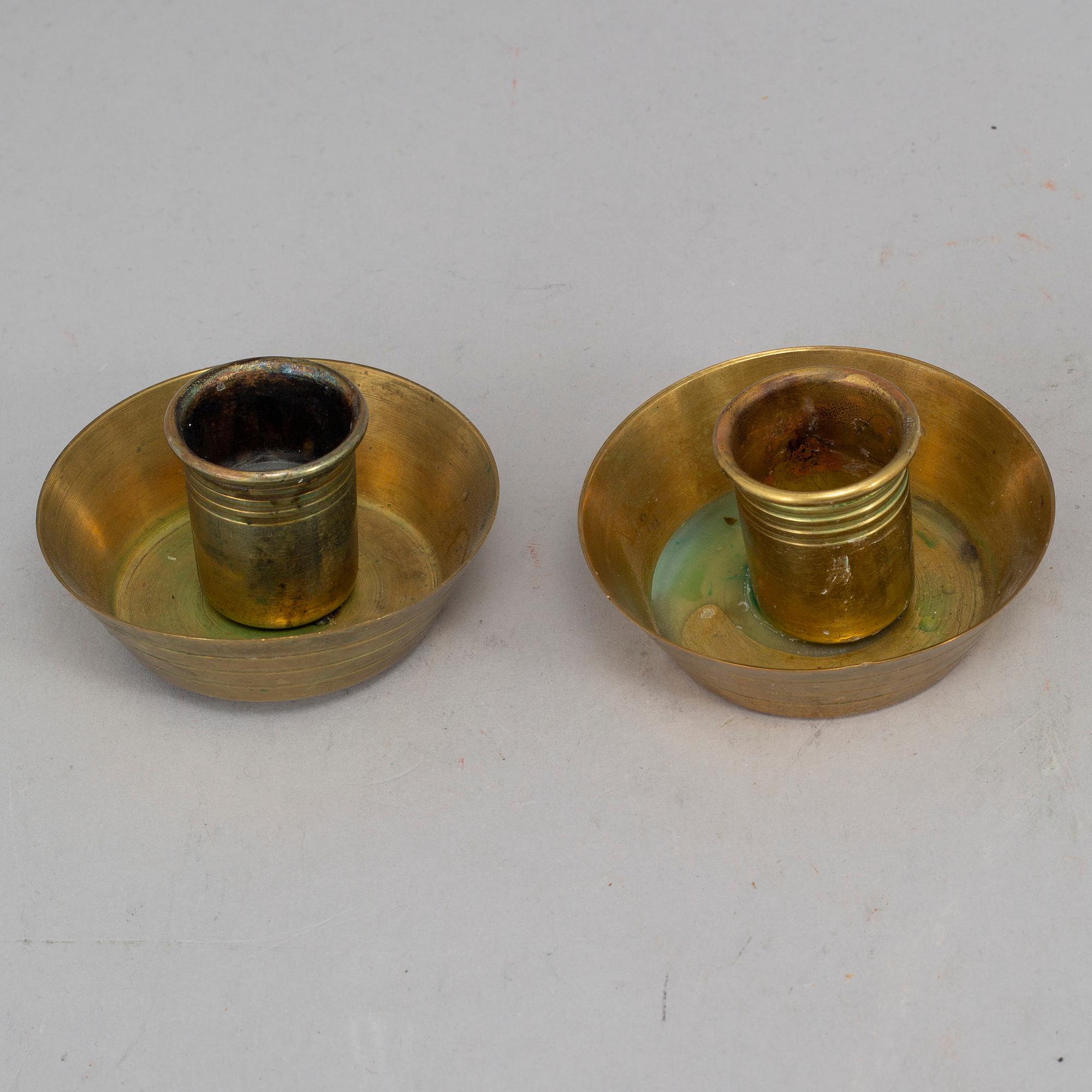 A pair of Art nouveau brass candelabra, early 20th Century.