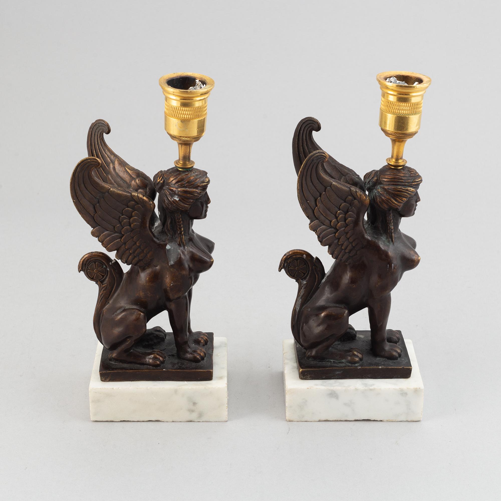 A pair of presumably Russian Empire candlesticks, early 19th Century.