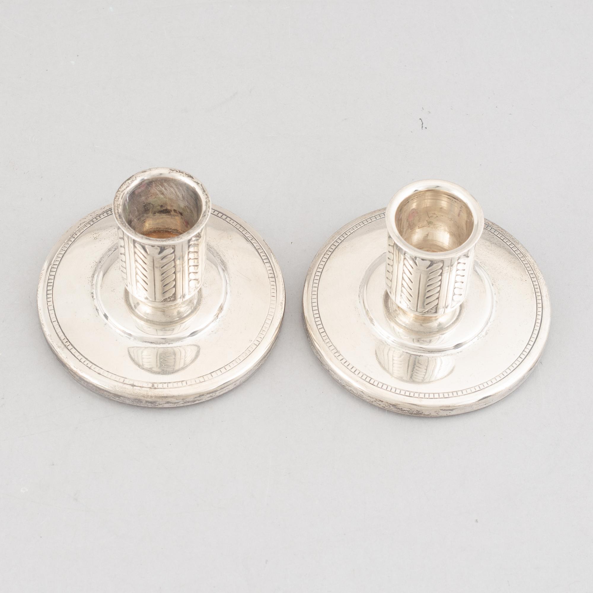 A pair of silver candlesticks, marks of W.A. Bolin, Stockholm, Sweden 1941.