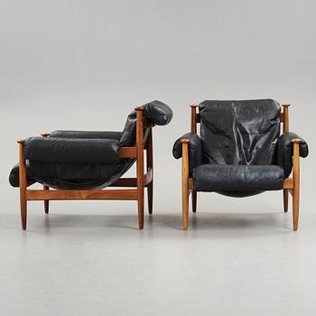 A pair of 'Amiral' easy chair by Eric Merthen.