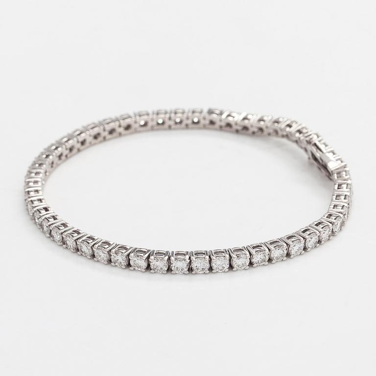 Tennis bracelet, brilliant cut diamonds, 18K white gold.