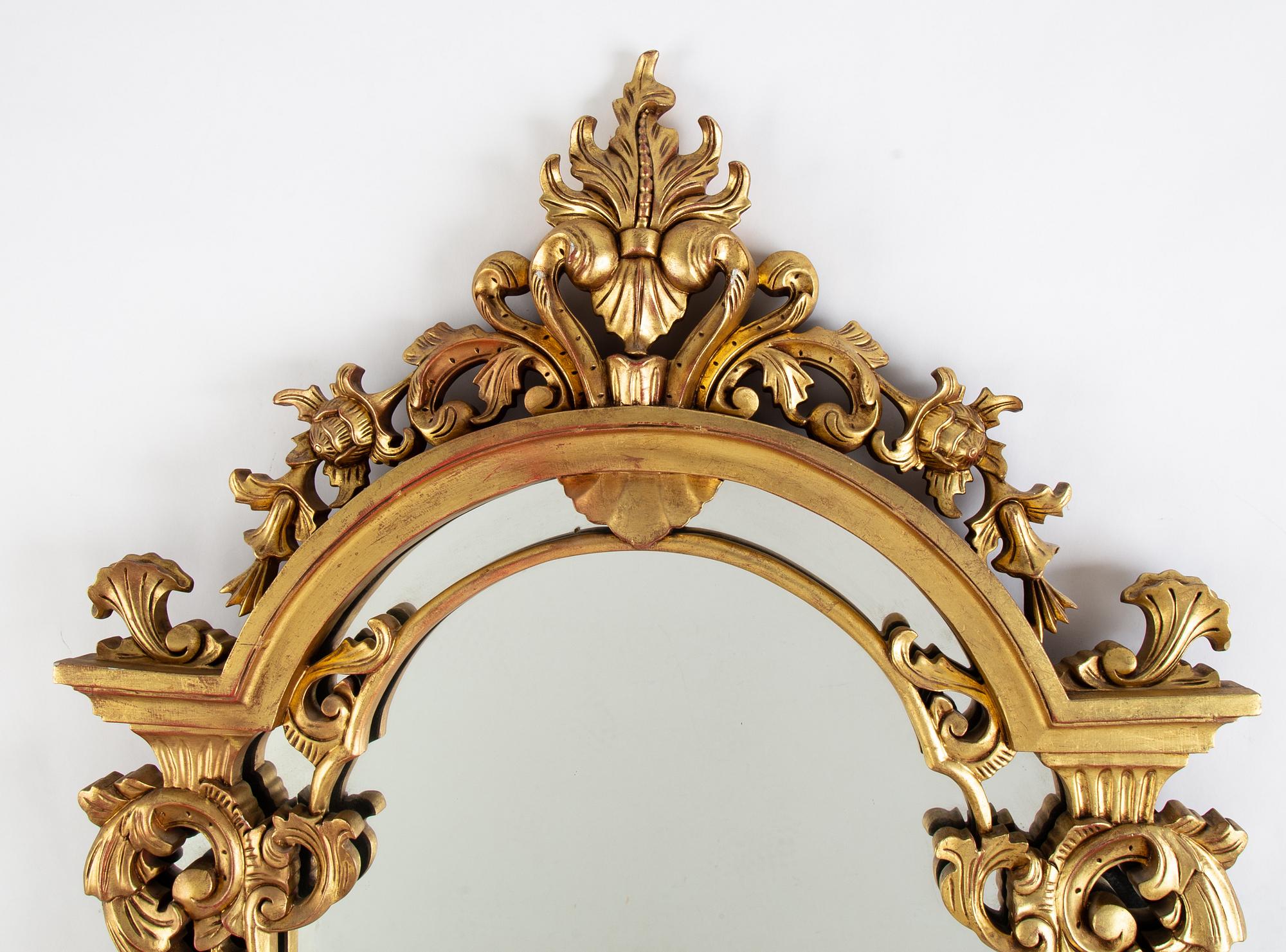 A rococo style mirror, second half of the 20th Century.