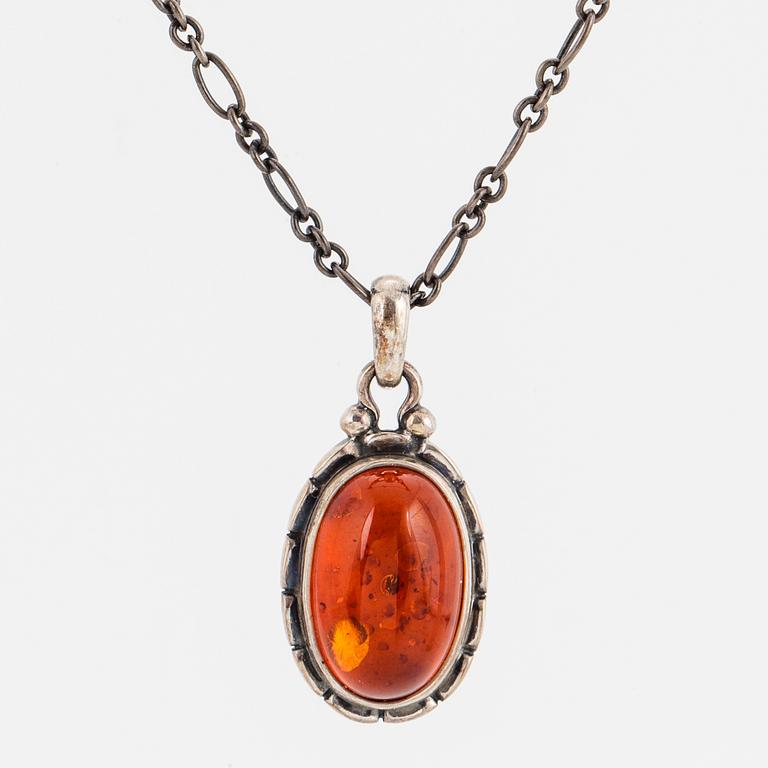 GEORG JENSEN, Pendant of the year 2001, with amber.