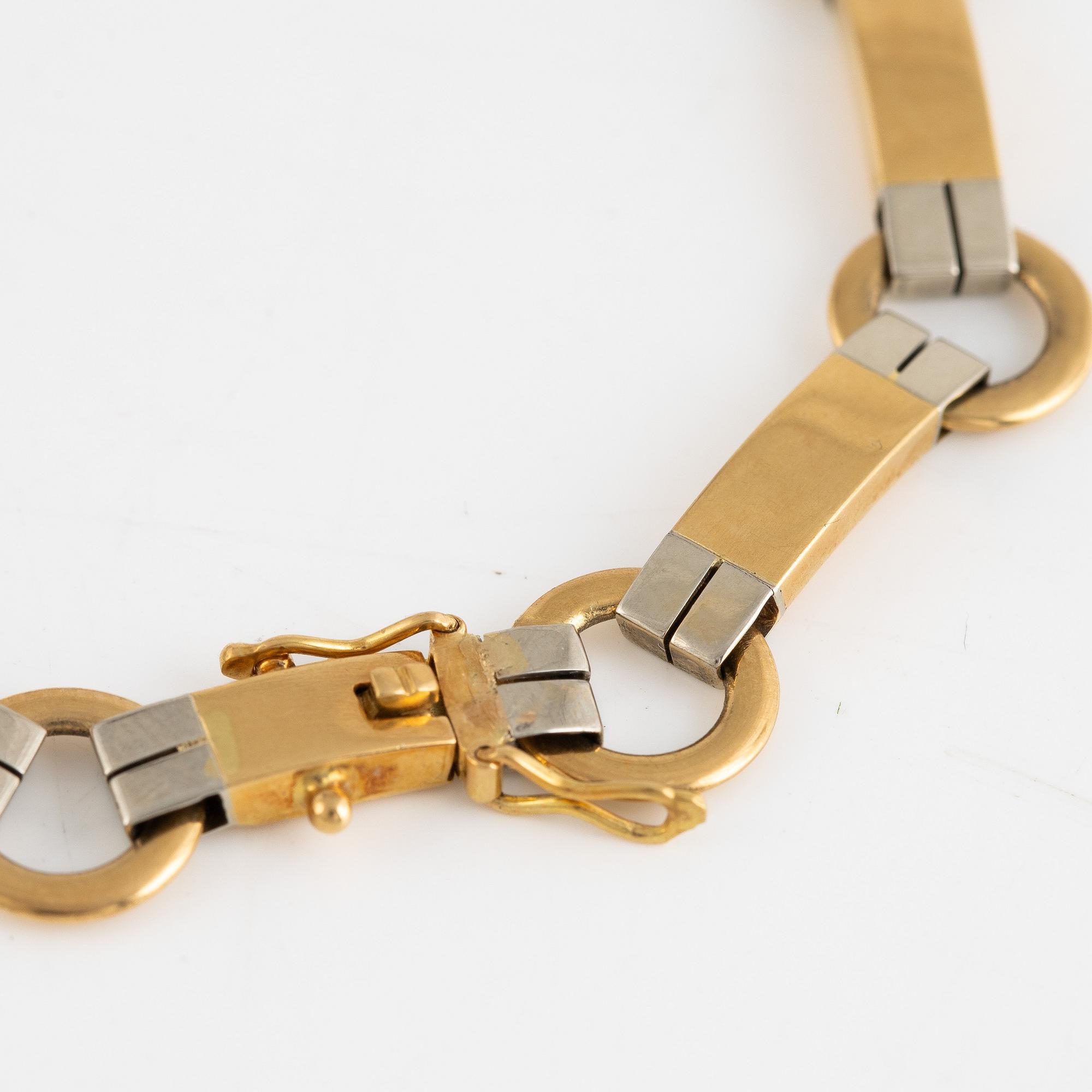 Armlänk, 18 k guld, svensk importstämpel.