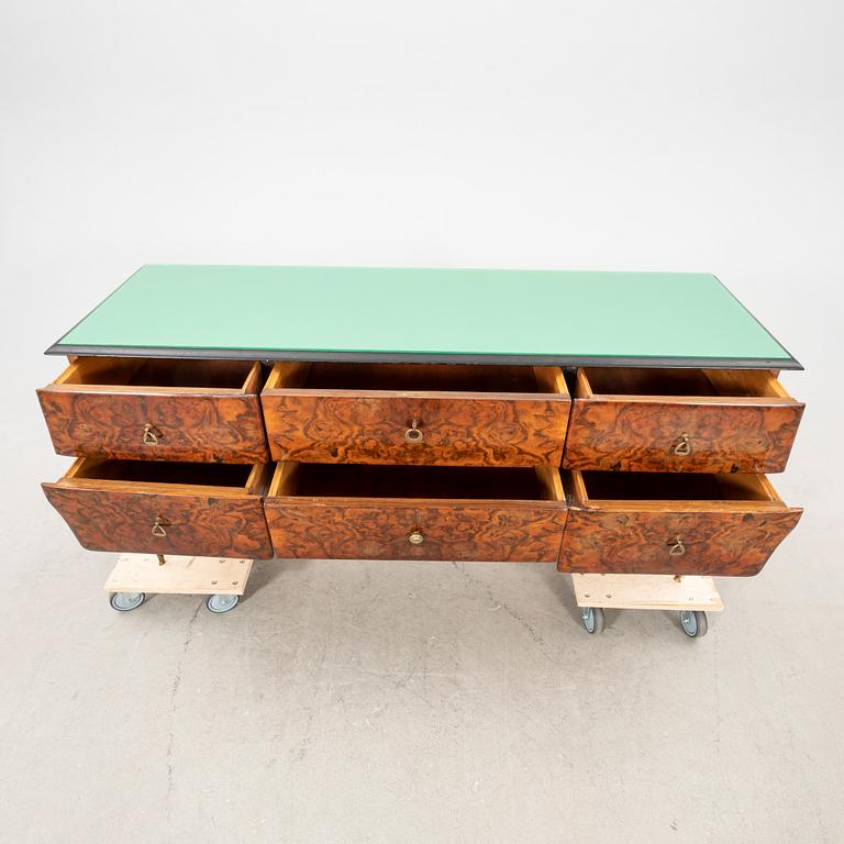 An Italian 1950s walnut sideboard.