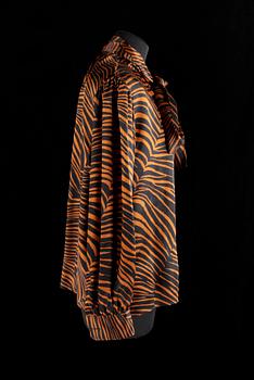 A set of two blouses by Yves Saint Laurent.