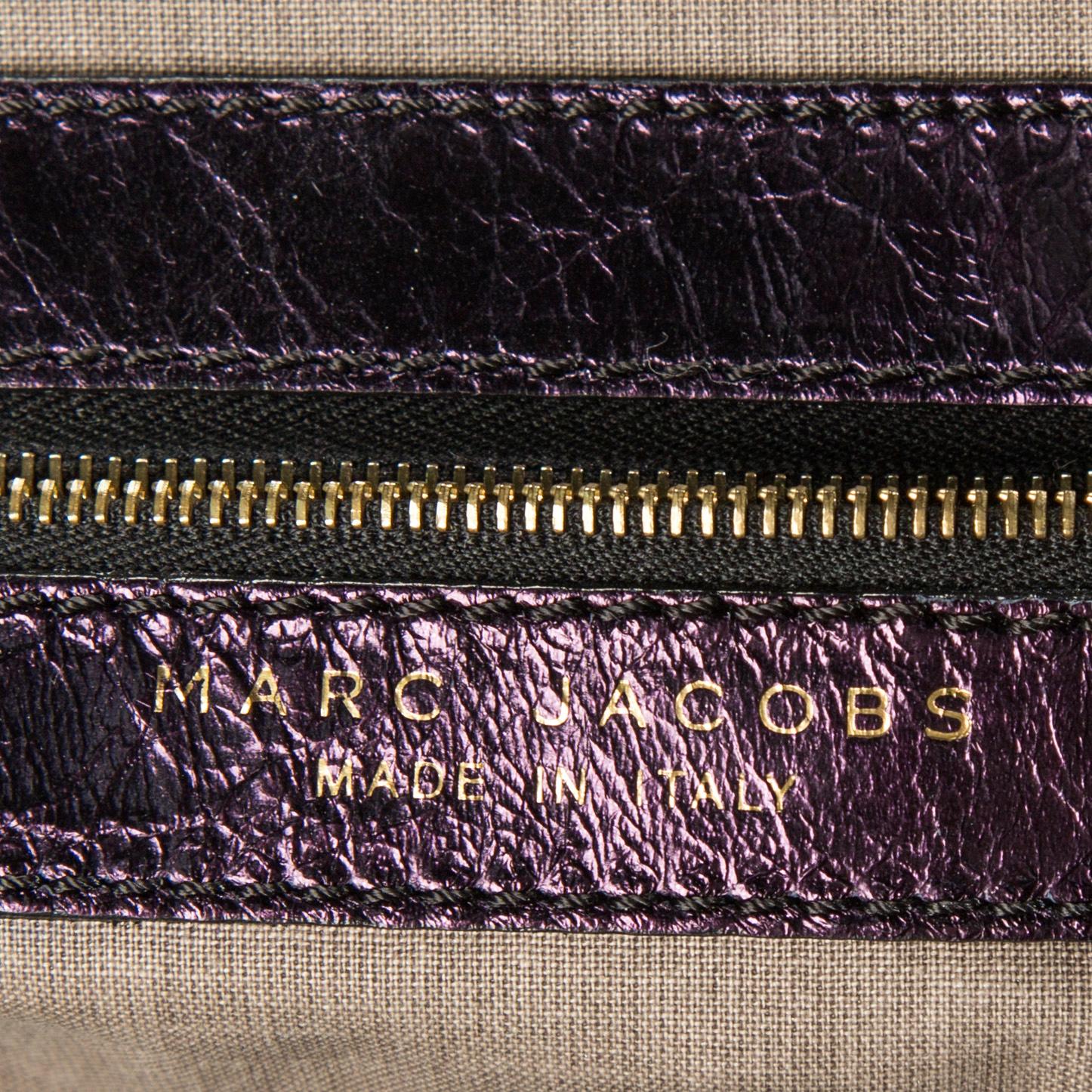 A bag by  MARC JACKOBS.