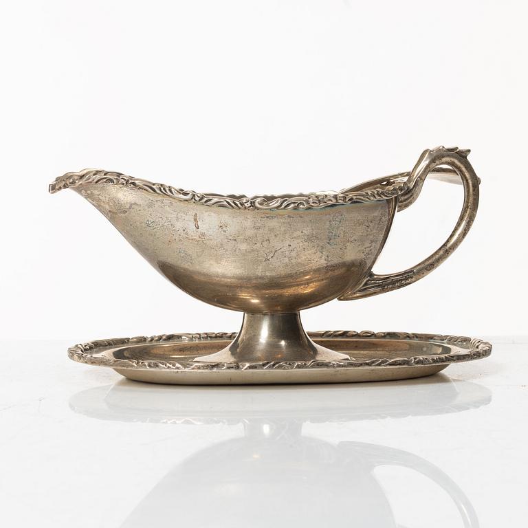 A silver sauceboat with tray and spoon, Anaya, Mexico, second half of the 20th Century.