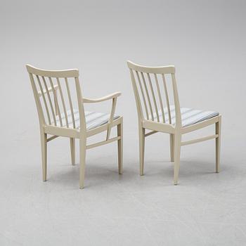 A dining table with two armchairs and six chairs by Carl Malmsten for Bodafors.