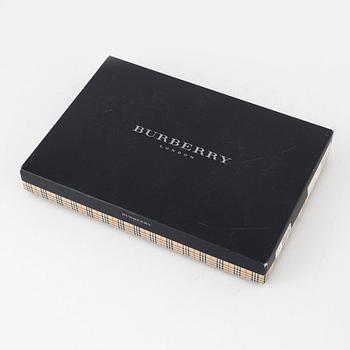 Burberry, a set of three towels.