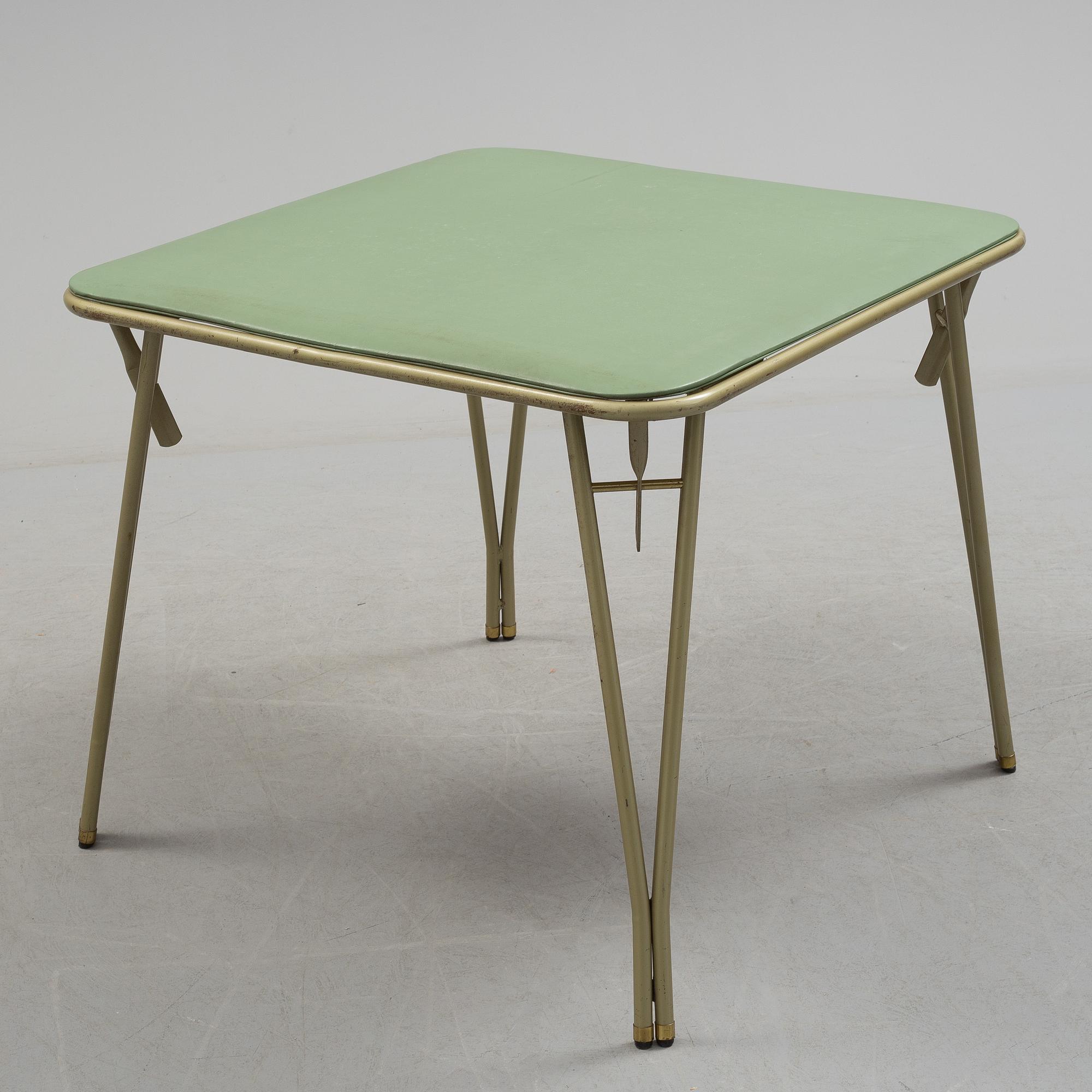 A table and four chairs by Dipetrol, second half of the 20th century.