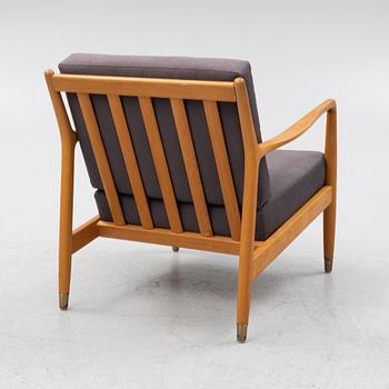 Folke Ohlsson, a beech 'USA-143' armchair, designed in 1953.