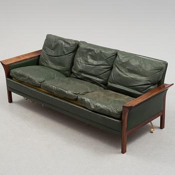 A 1960's Danish sofa, with 2 easy chairs and 2 tables by Glostrup.