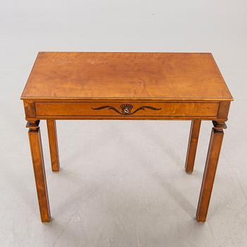 A 1930s birch table.