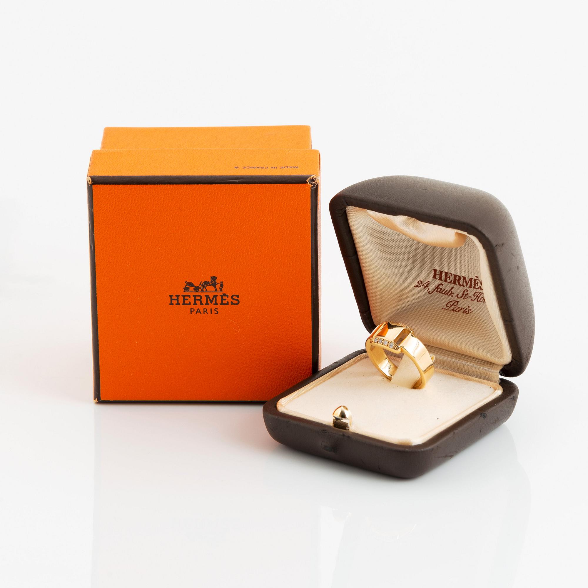 Hermès ring 18K guld med runda briljantslipade diamanter.
