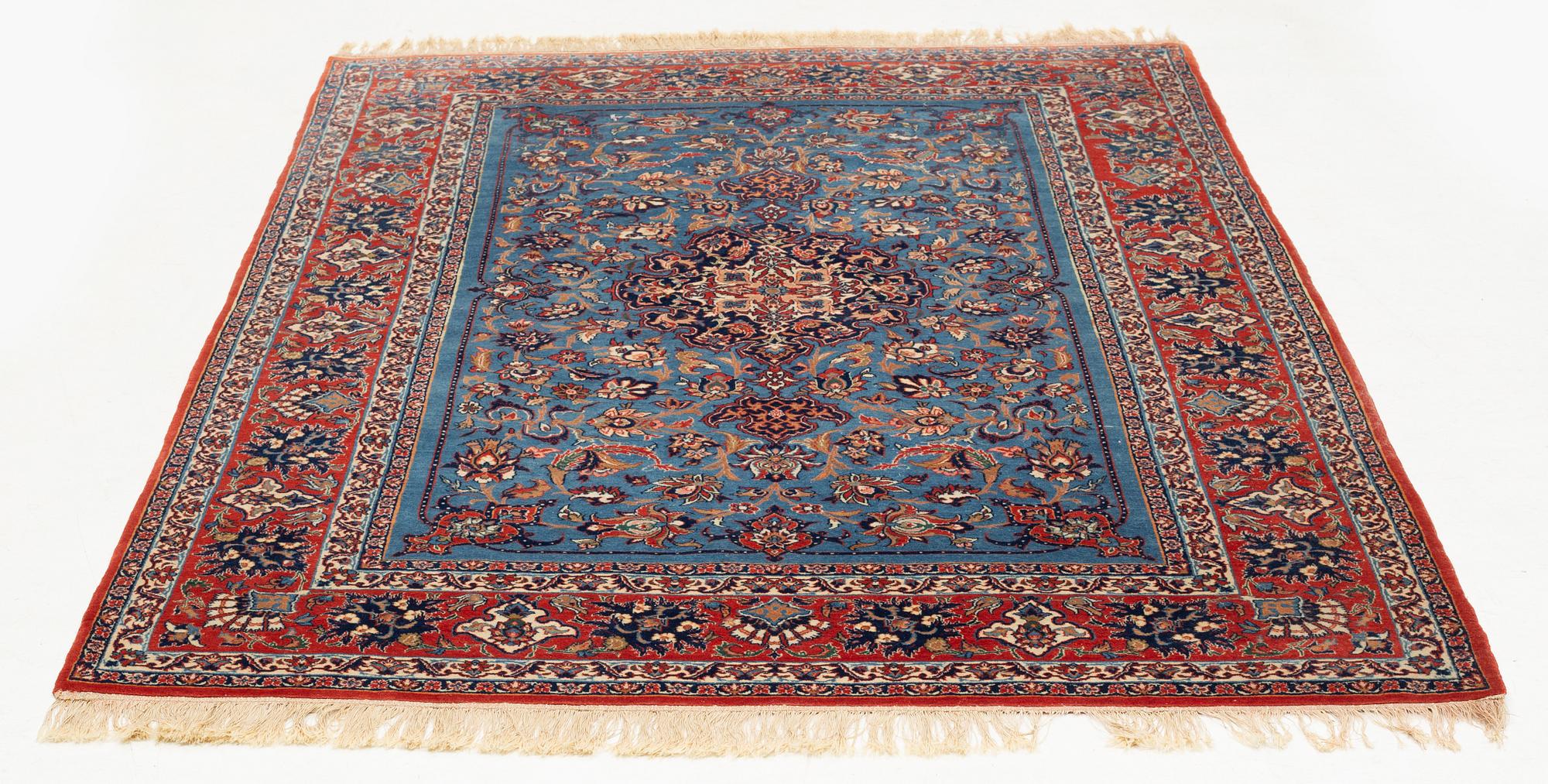 An antique Isfahan, ca 220 x 145 cm.