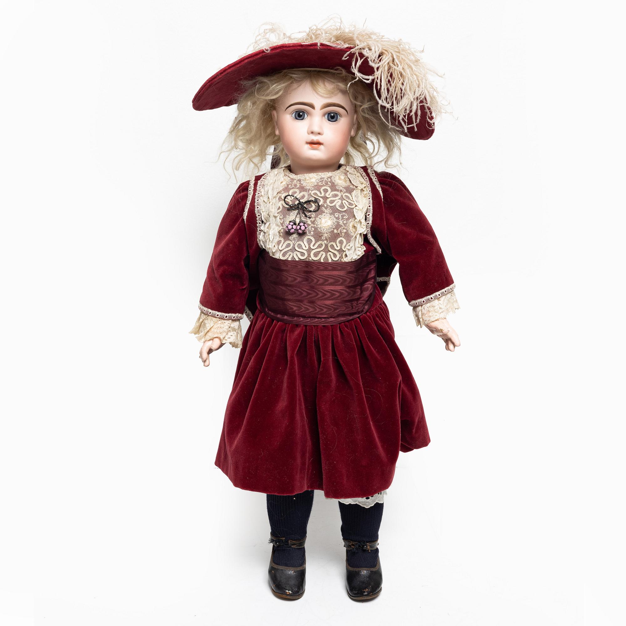 Girl doll, likely France, around the year 1900.