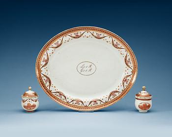 A armorial serving dish and two custard cups with covers, Qing dynasty, Qianlong (1736-95).