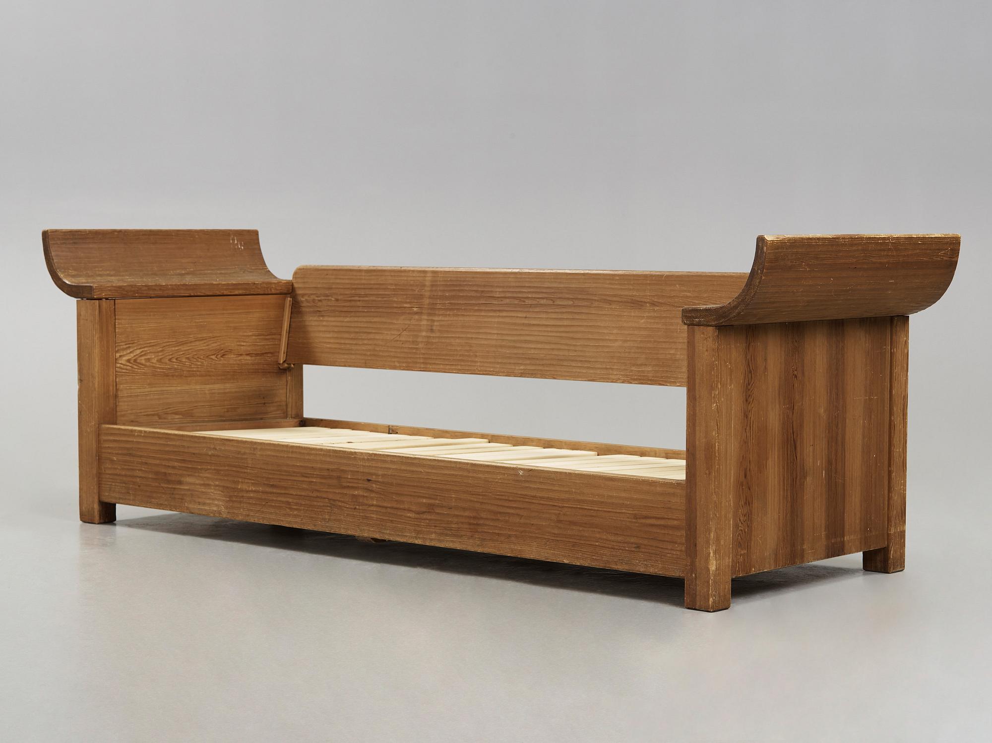 An Axel Einar Hjorth stained pine sofa 'Sandhamn', Nordiska Kompaniet 1933.