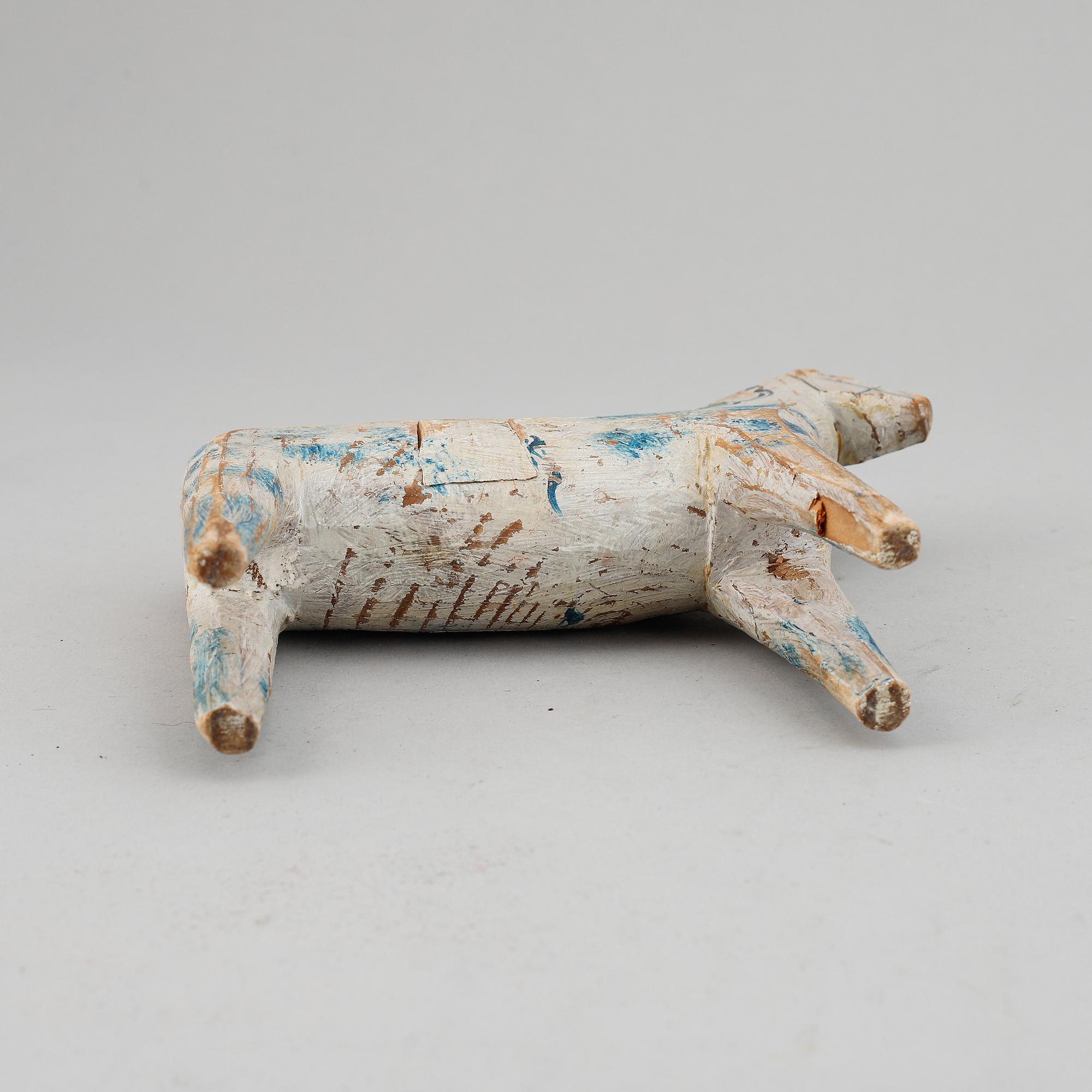 A painted Swedish wooden horse from the early 20th century.