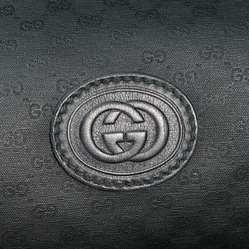 GUCCI, KLÄDÖVERDRAG SAMT VÄSKA, 1980-tal.