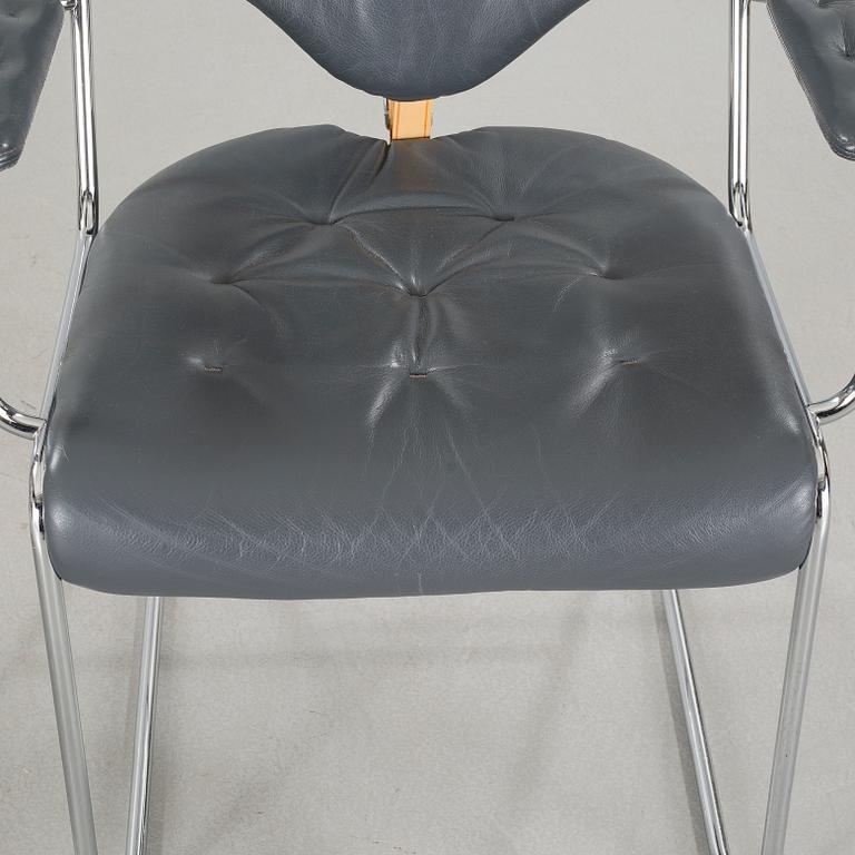 A pair of chairs by Sam Larsson for Dux, designed in 1974.