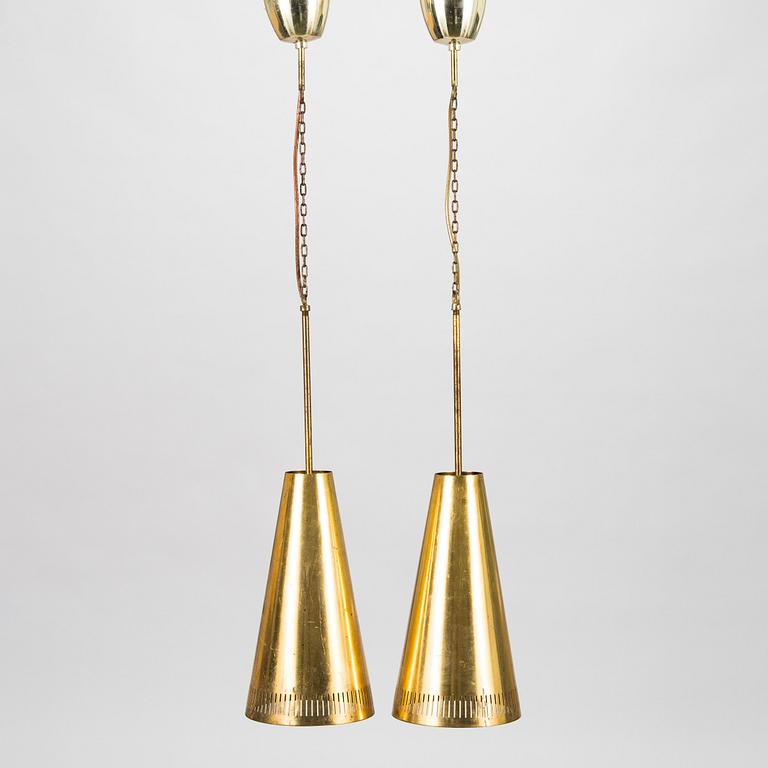 Paavo Tynell, a pair of 1953 pendant lights for Taito.