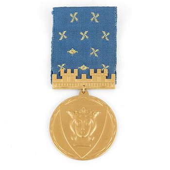 MEDALJ, 18k guld, 1954. Total vikt 31,9 gram.
