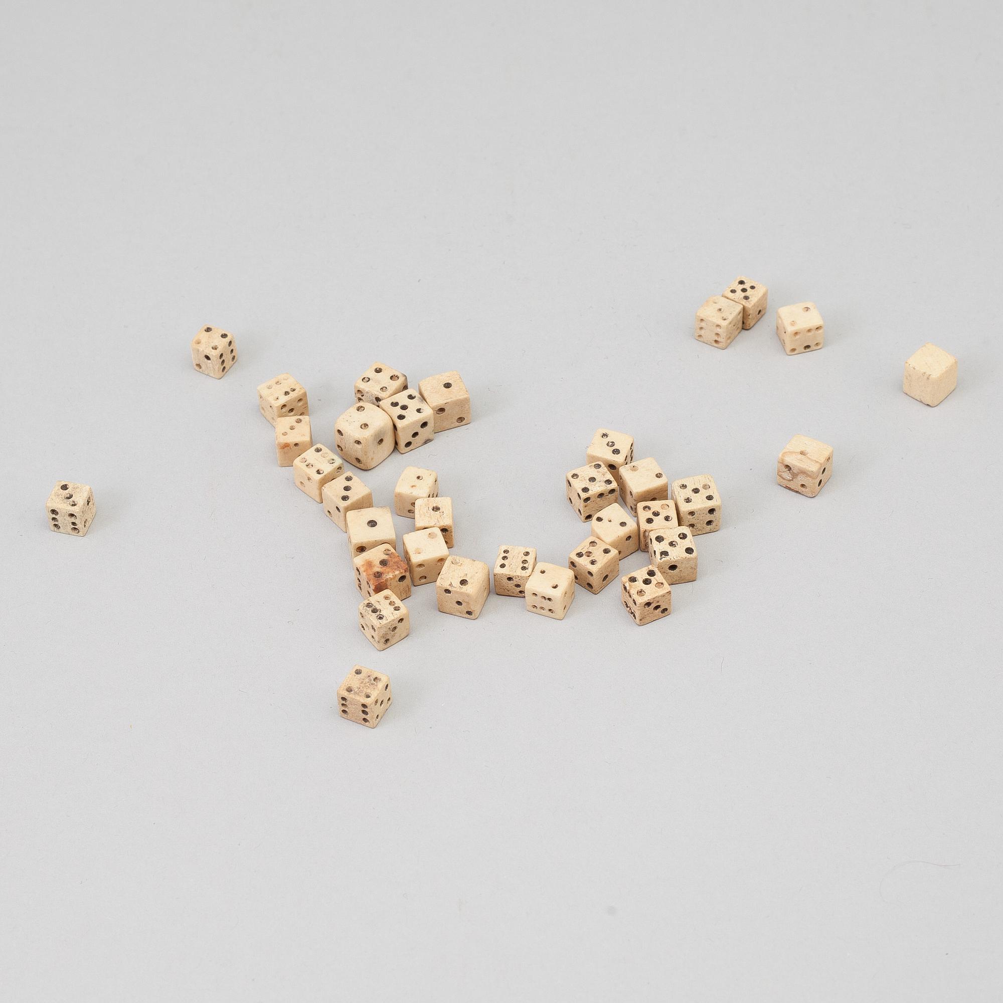 a collection of 34 miniature dice, bone, 19th century.