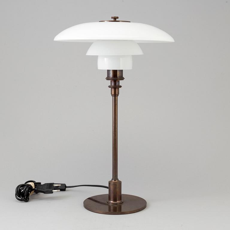 POUL HENNINGSEN, a 'PH-3/2' glass and copper table light from Louis Poulsen.