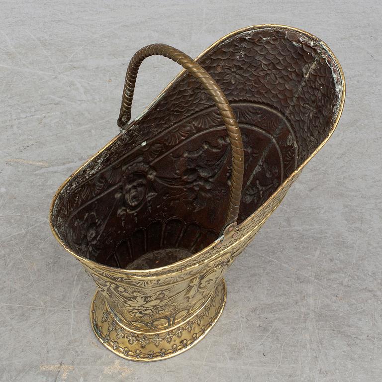 A 19th century brass coal basket.