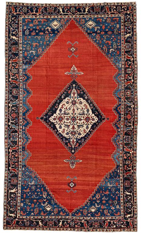 A CARPET, an antique Bakshaish, ca 693 x 398,5 cm, dated "1298"AH/1880 AD probably.