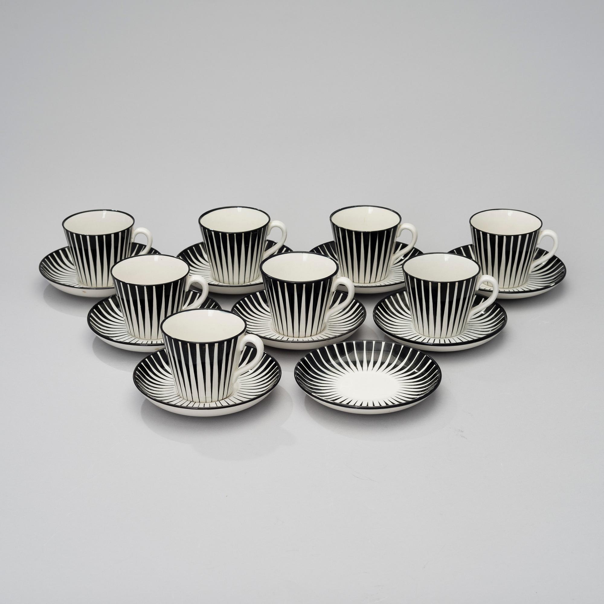 EUGEN TROST, 8 kaffekoppar med 9 fat, flintgods, "Zebra", Gefle. I produktion 1955-1967.