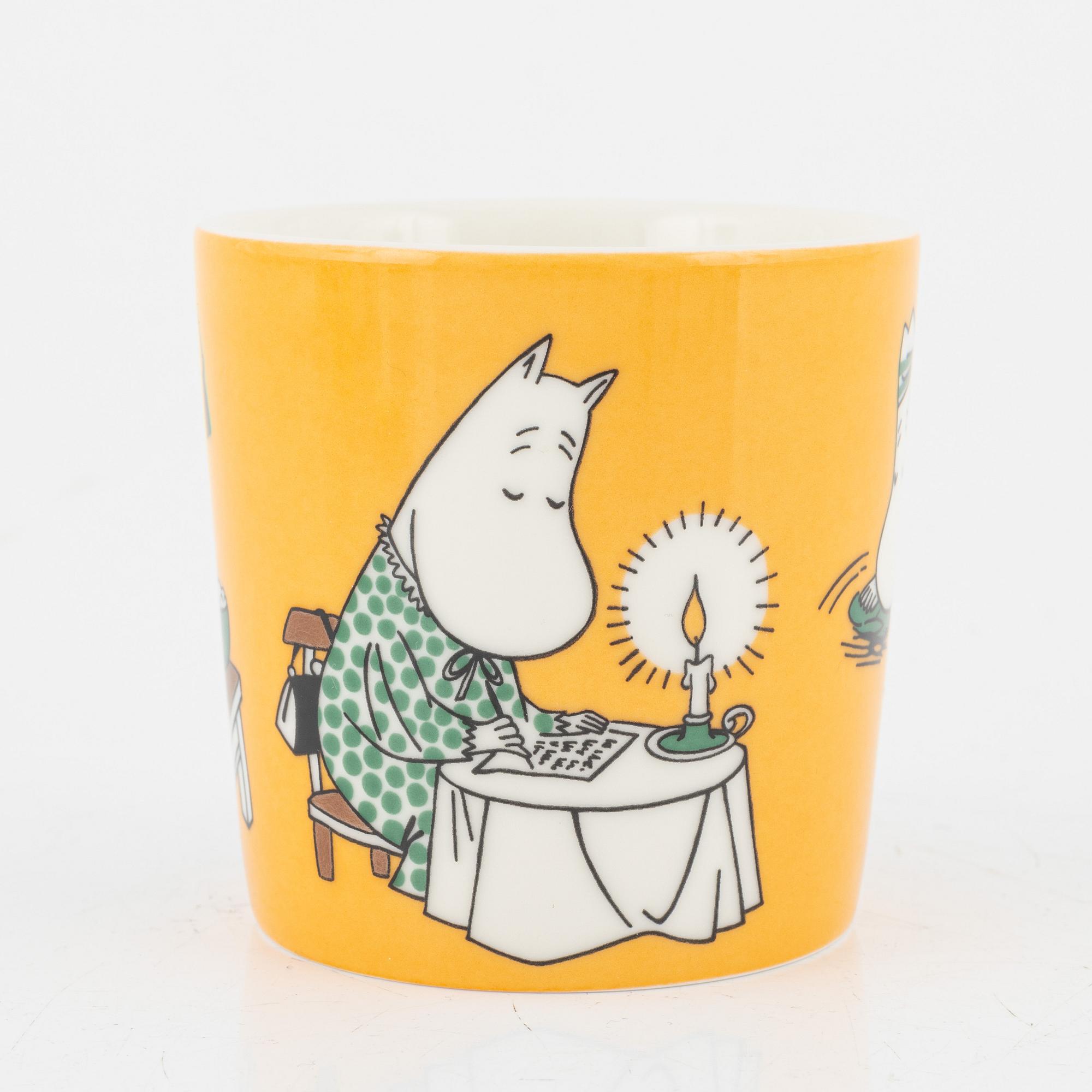 Eleven porcelain Moomin mugs, Arabia, Finland.