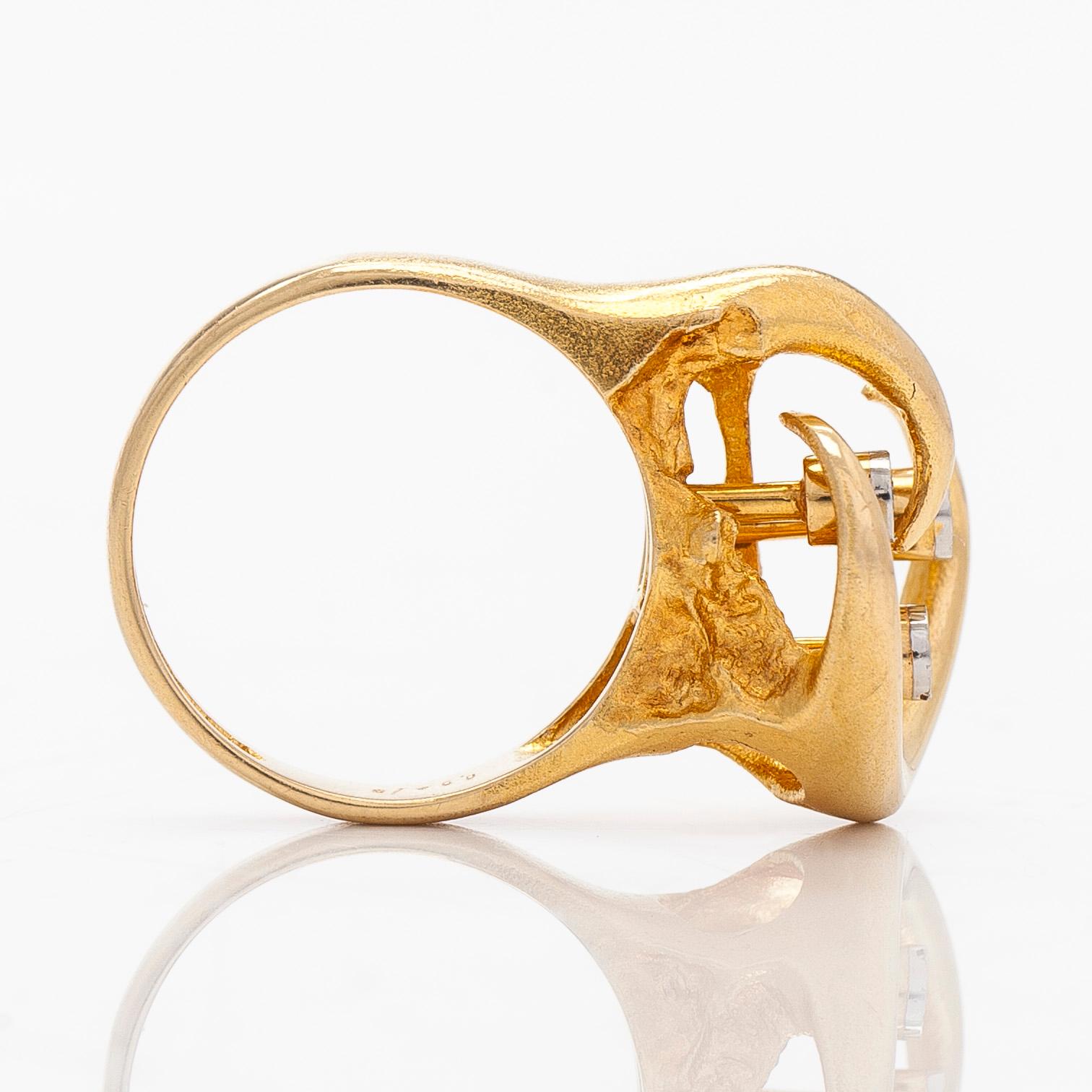 Björn Weckström, An 18K gold ring, with octagon-cut diamonds totalling ca 0.06 ct according to engraving, Lapponia 1975.