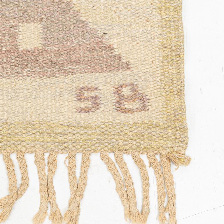 A flat weave, signed SB. 215 x 150 cm.