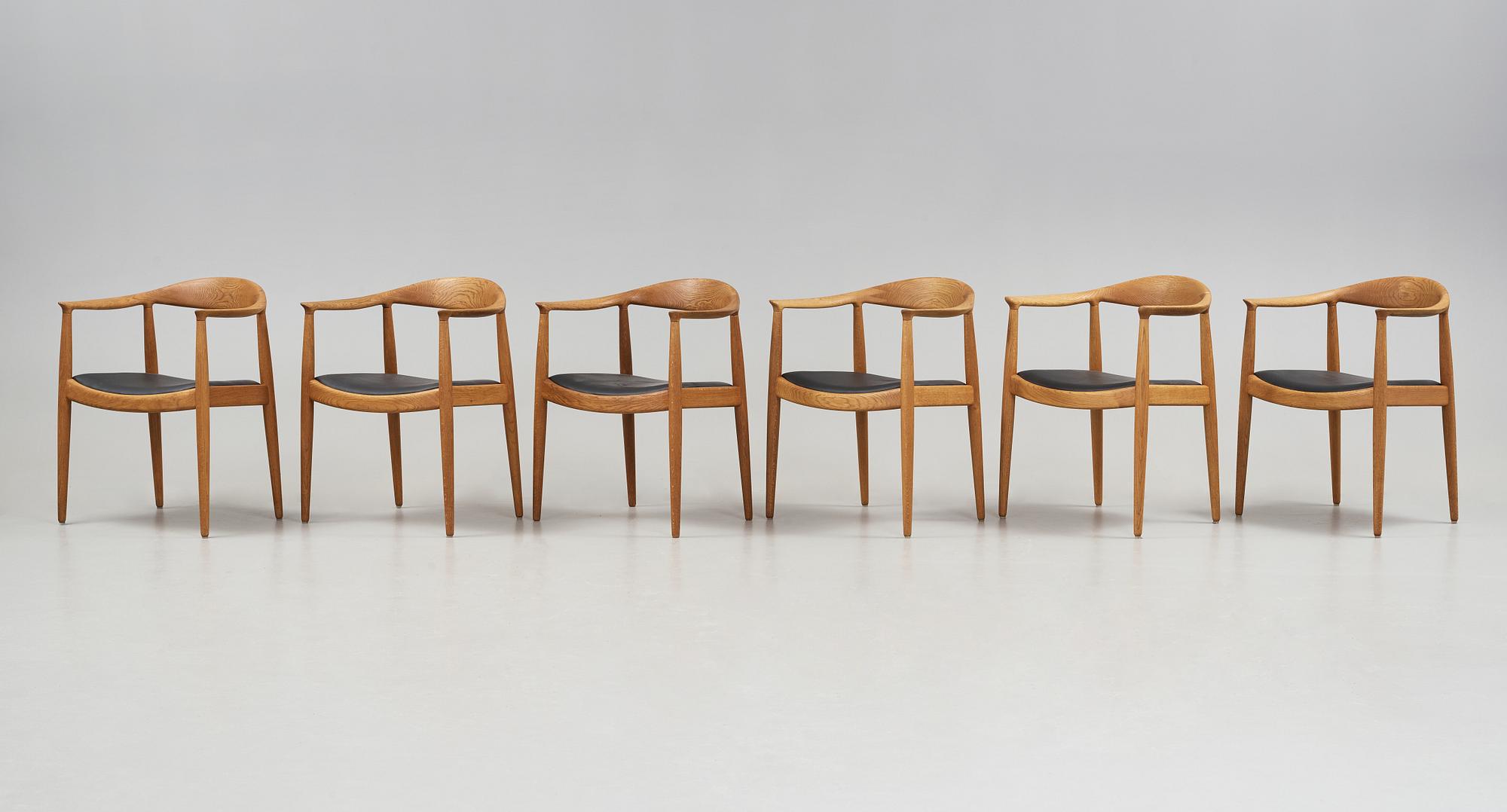 A set of six Hans J Wegner oak 'The Chair', Johannes Hansen, Denmark.