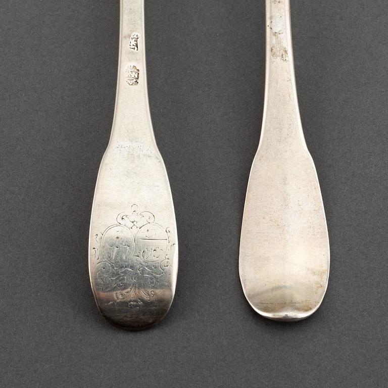 A matched set of nine 18th century silver spoons, marked Basel and Naunur (Belgum).