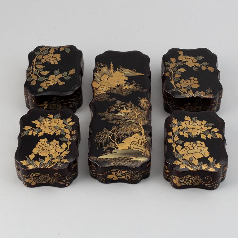 A box containing smaller boxes and mother of pearl chips for games, late Qing dynasty, 19th Century.