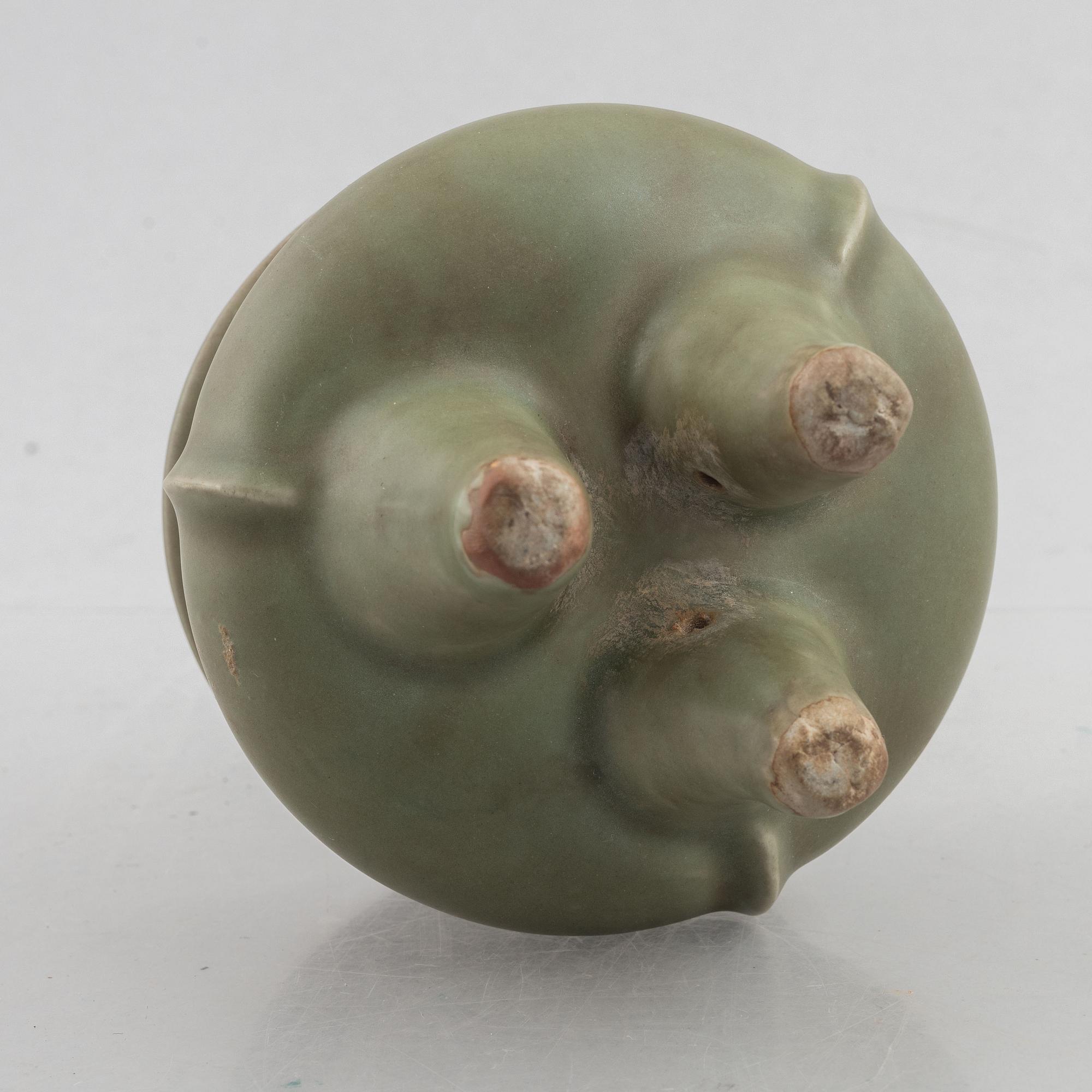 A Chinese celadon tripod censer, late Ming dynasty, for the Southeastern market.